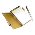 Metal Memo Pad titular con la pluma y el papel